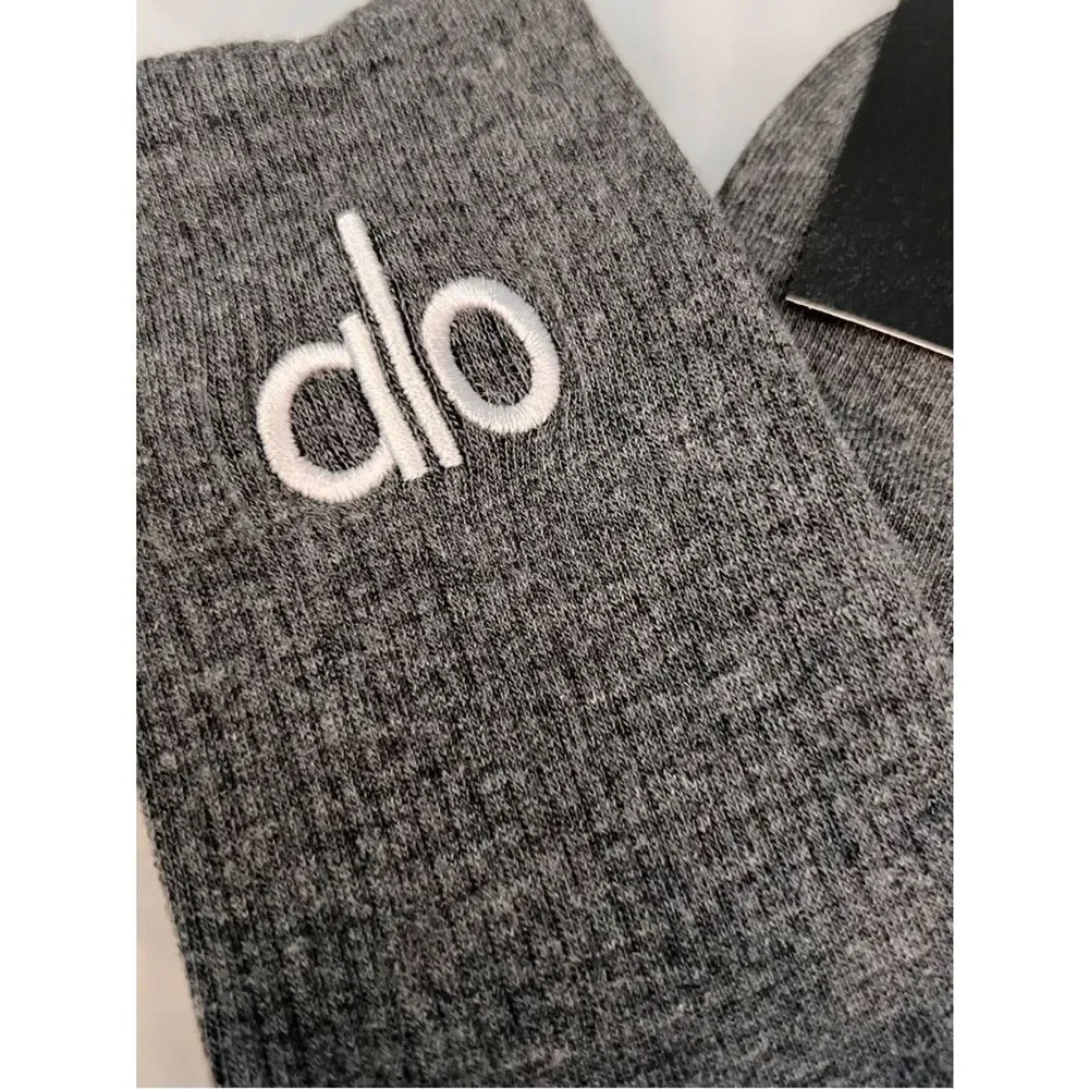 ALO Yoga unisex half crew understated socks in gray embroidered logo